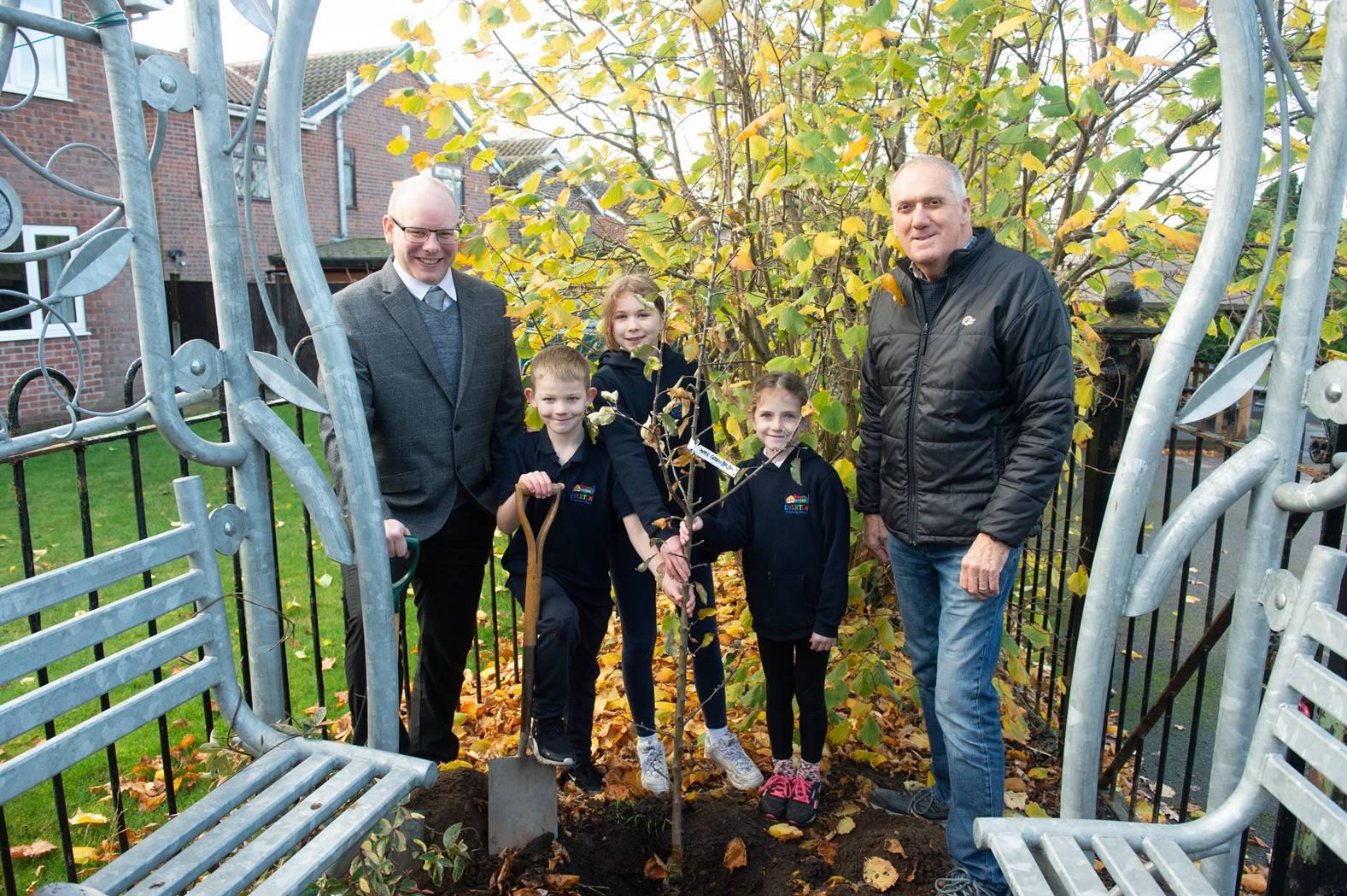 School Council members accepting an apple tree from the Retford Rotary: Rotakids project.